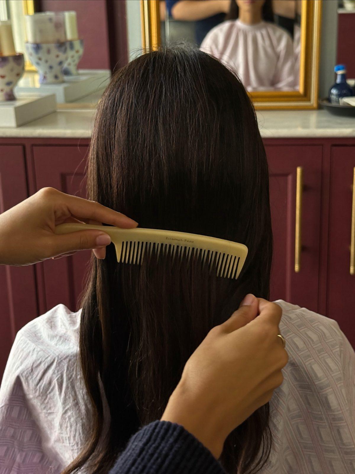 Hair styling detail in a salon