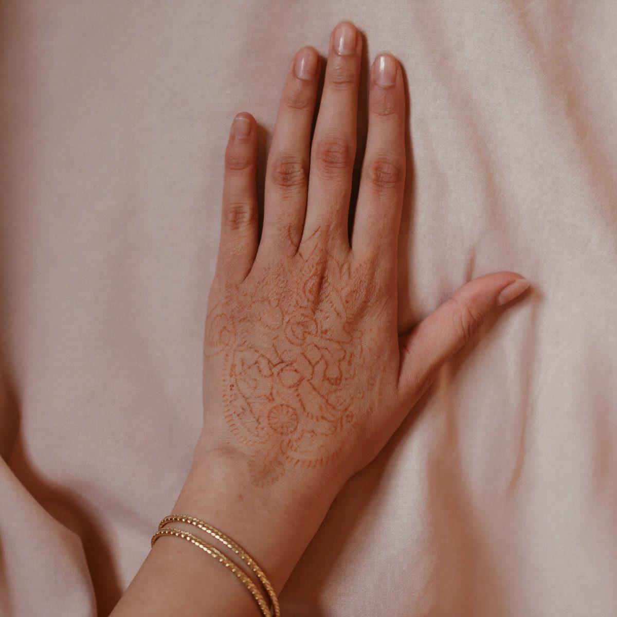 Henna design on hands